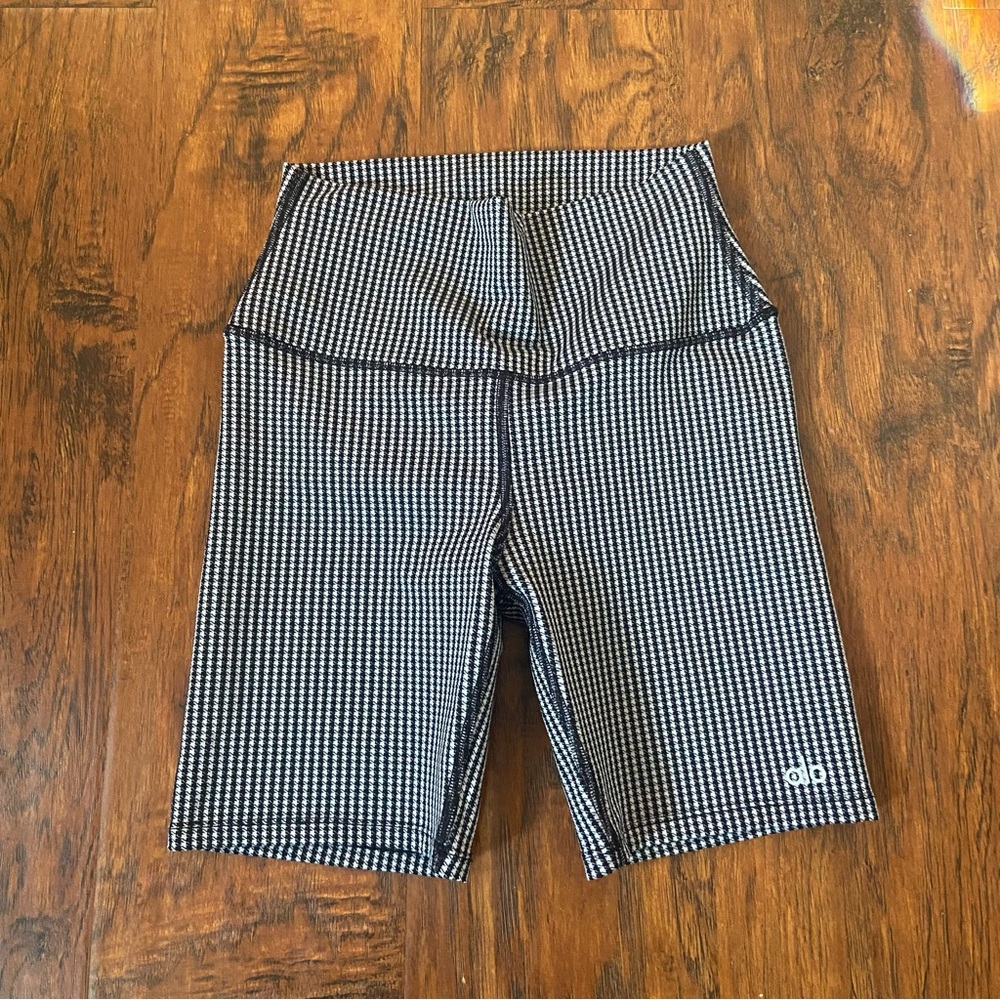 Alo gingham checkered print workout shorts.